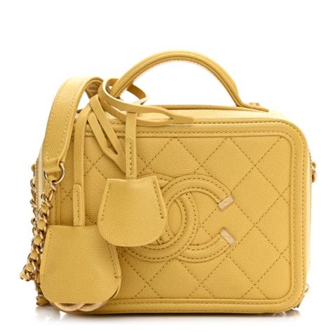 chanel caviar quilted small cc filigree vanity case yellow